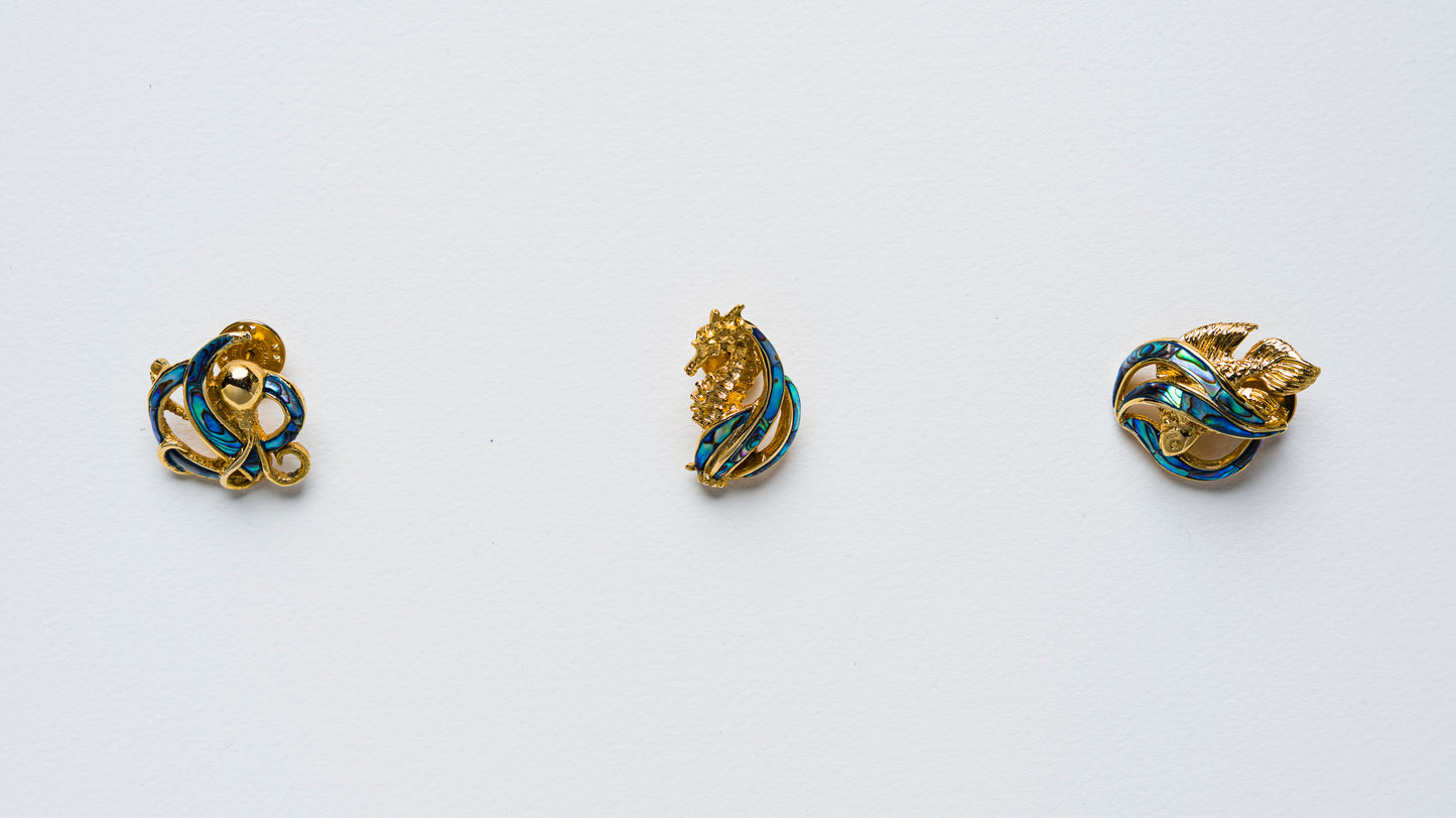 Triton's Brooches in Paua Shell