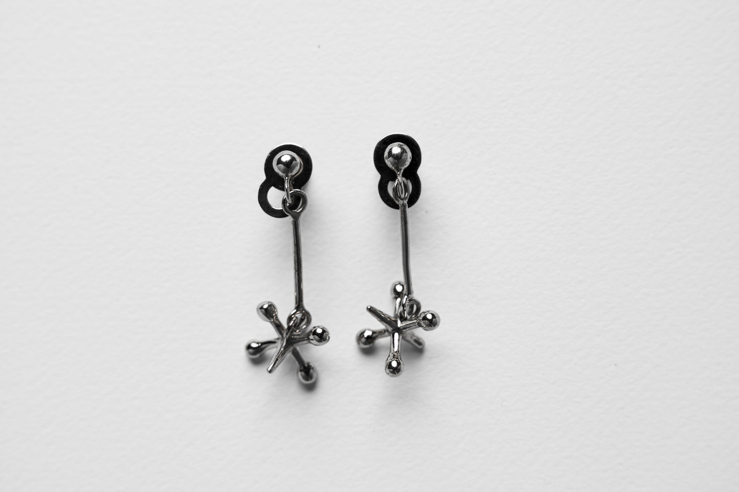 Jackstone Dangling Earrings plated in Silver