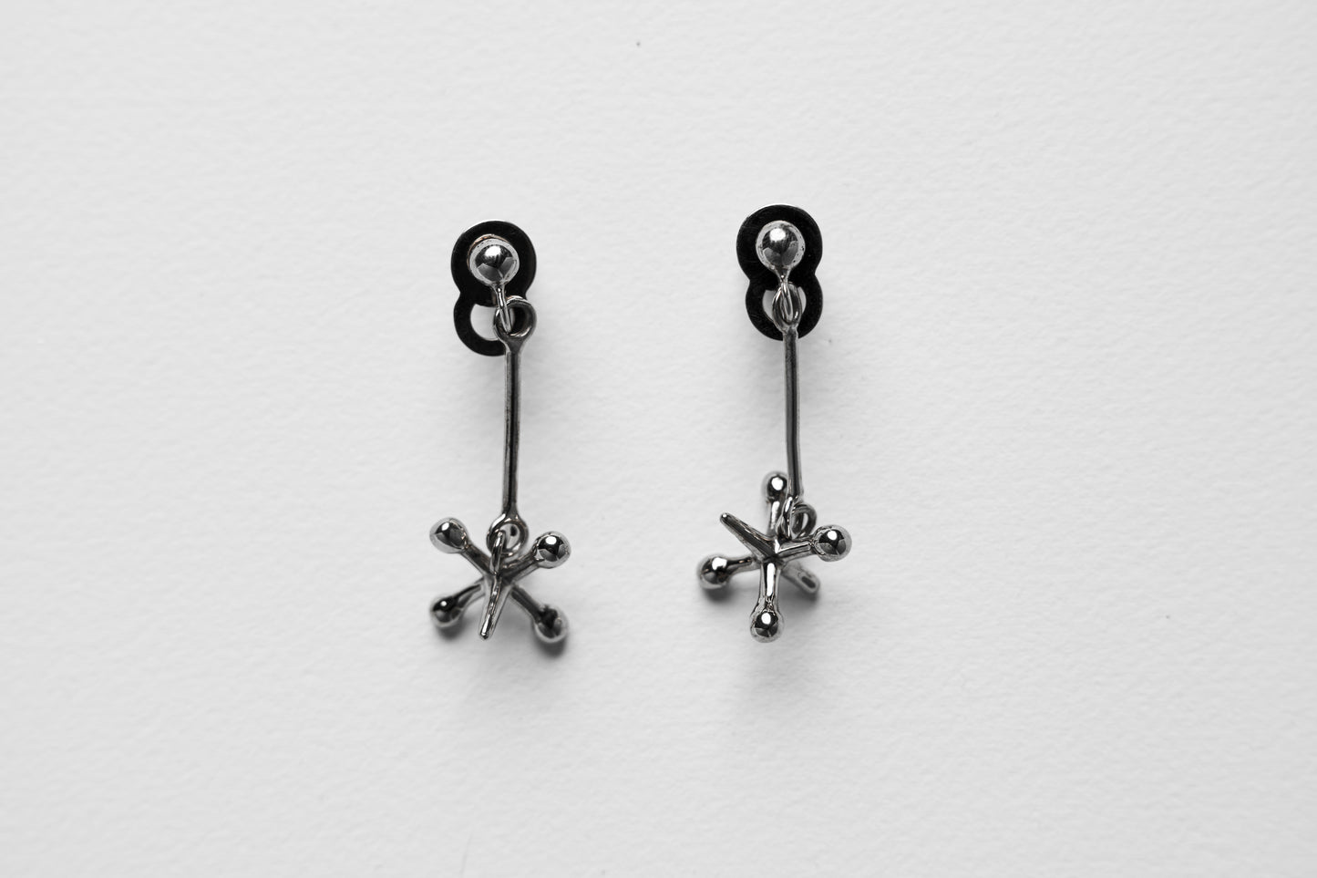 Jackstone Dangling Earrings plated in Silver
