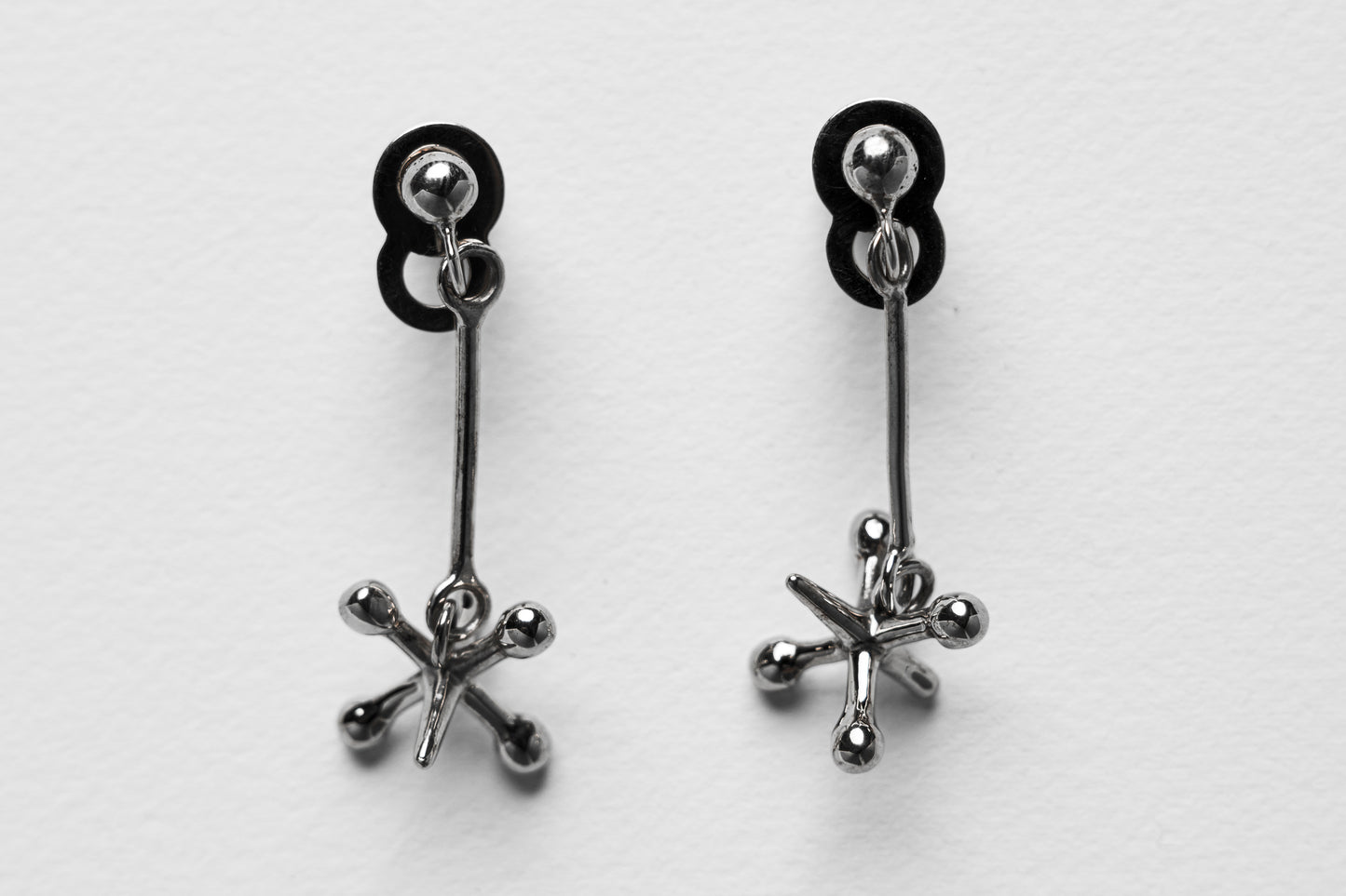 Jackstone Dangling Earrings plated in Silver