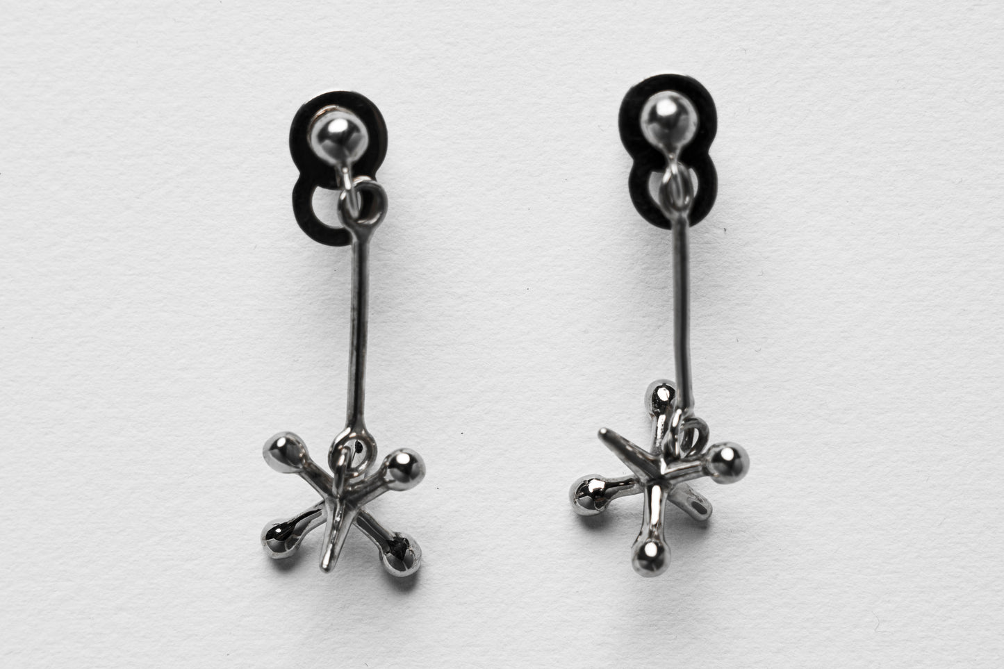 Jackstone Dangling Earrings plated in Silver