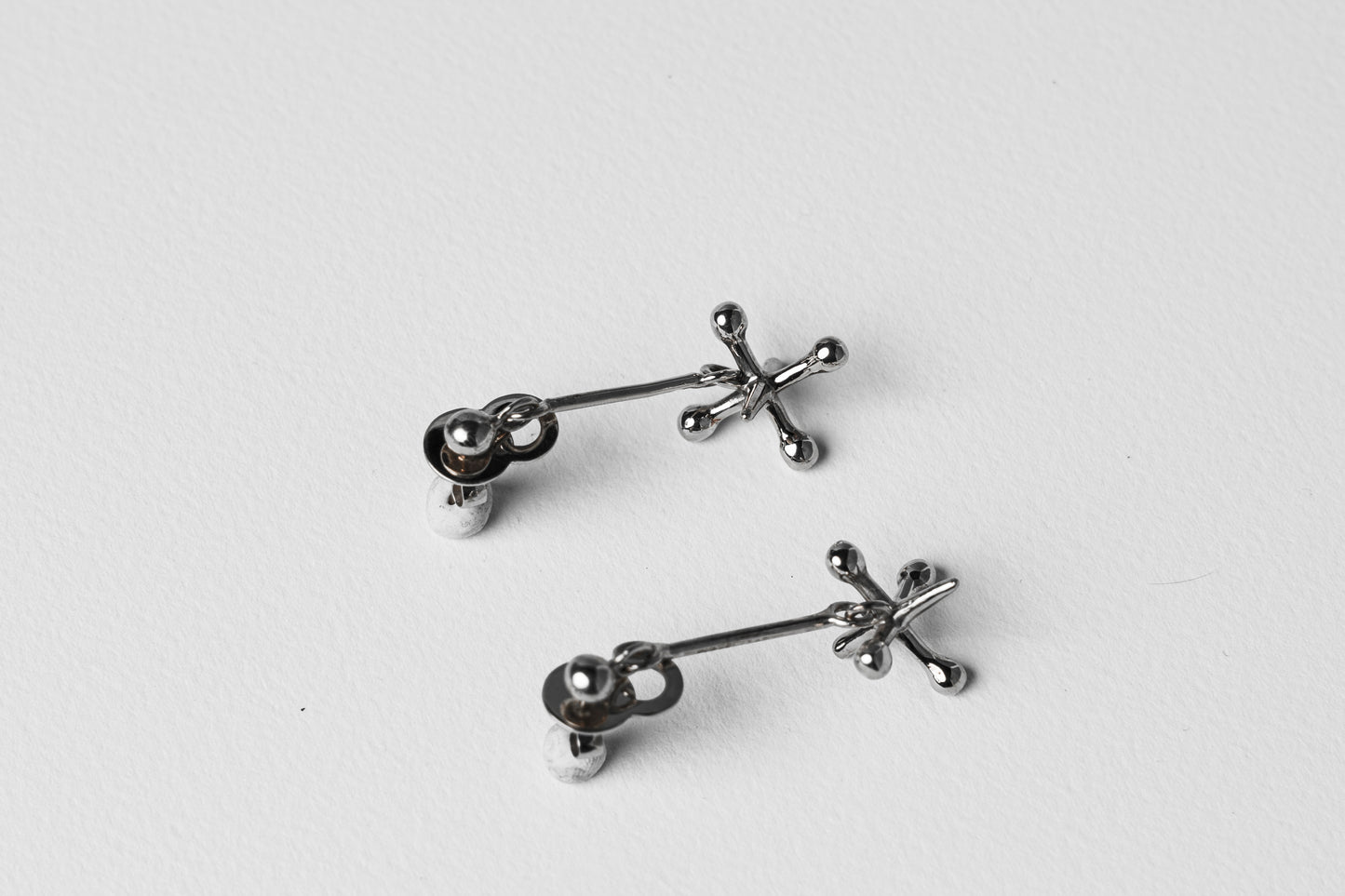 Jackstone Dangling Earrings plated in Silver
