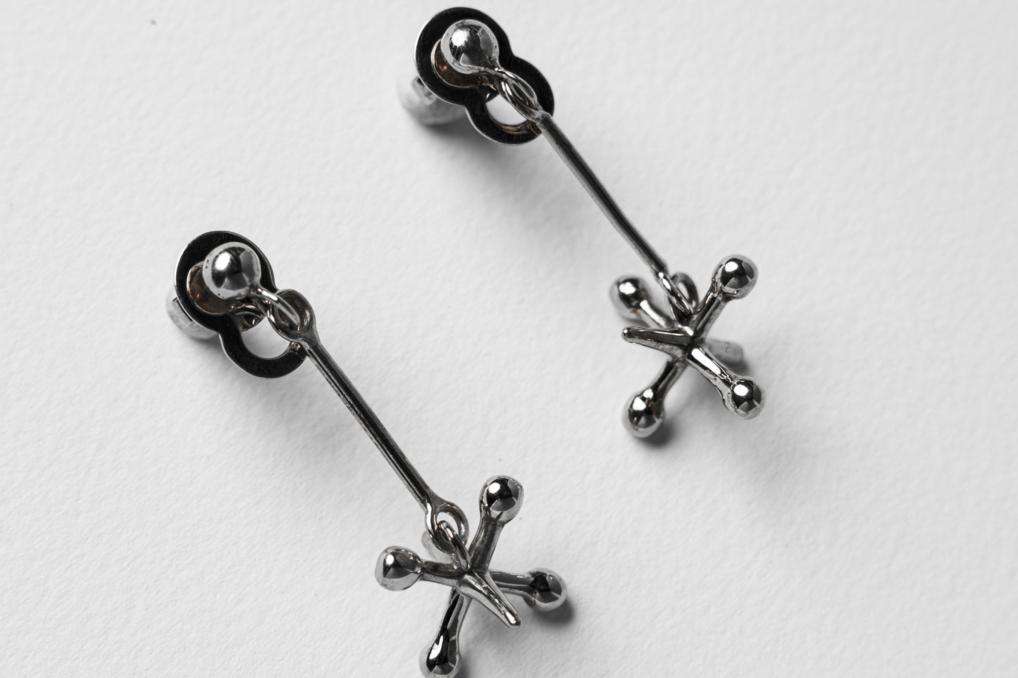 Jackstone Dangling Earrings plated in Silver
