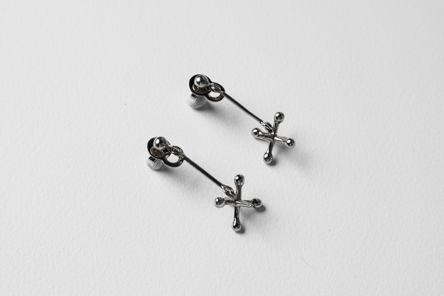 Jackstone Dangling Earrings plated in Silver