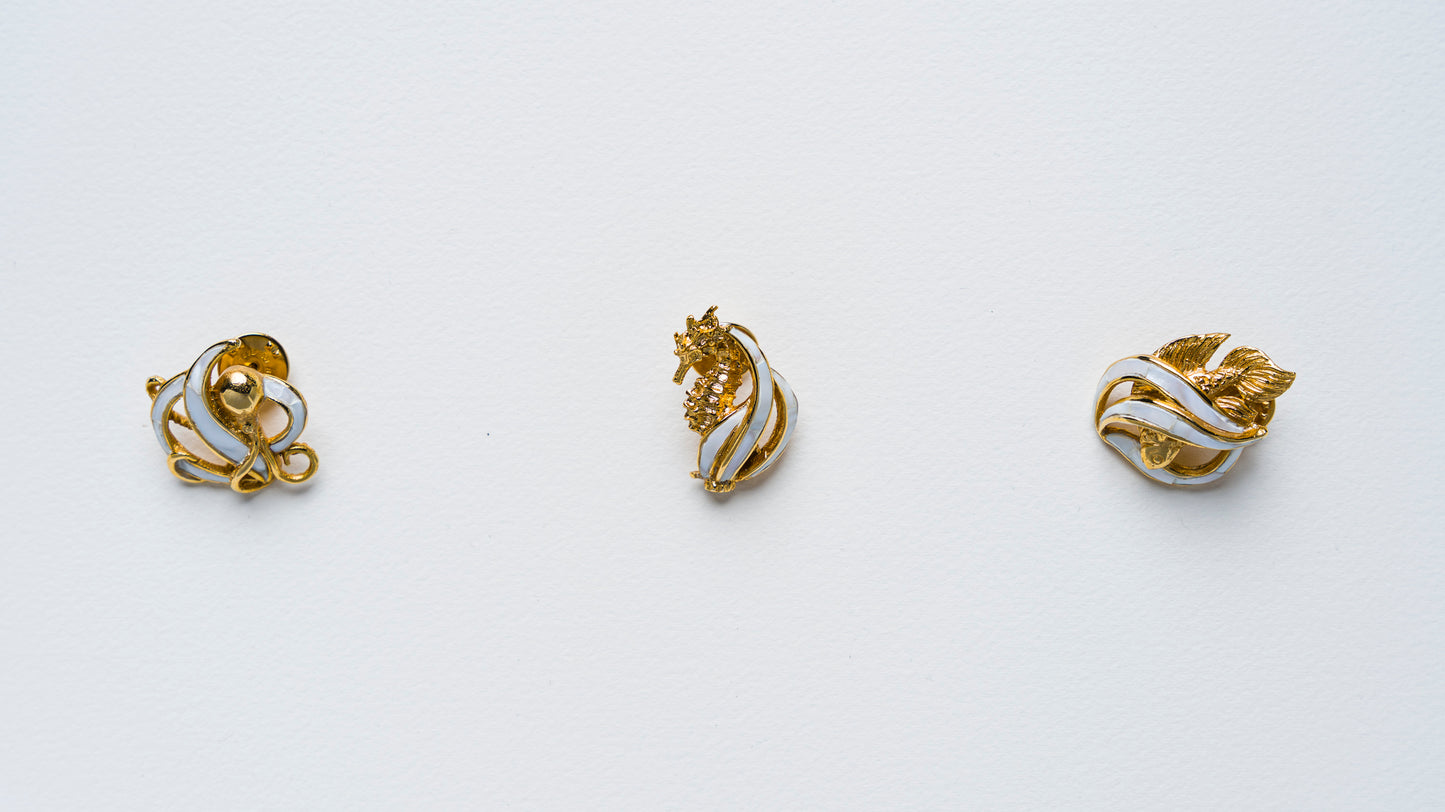 Triton's Brooches in White Cabebe Shell
