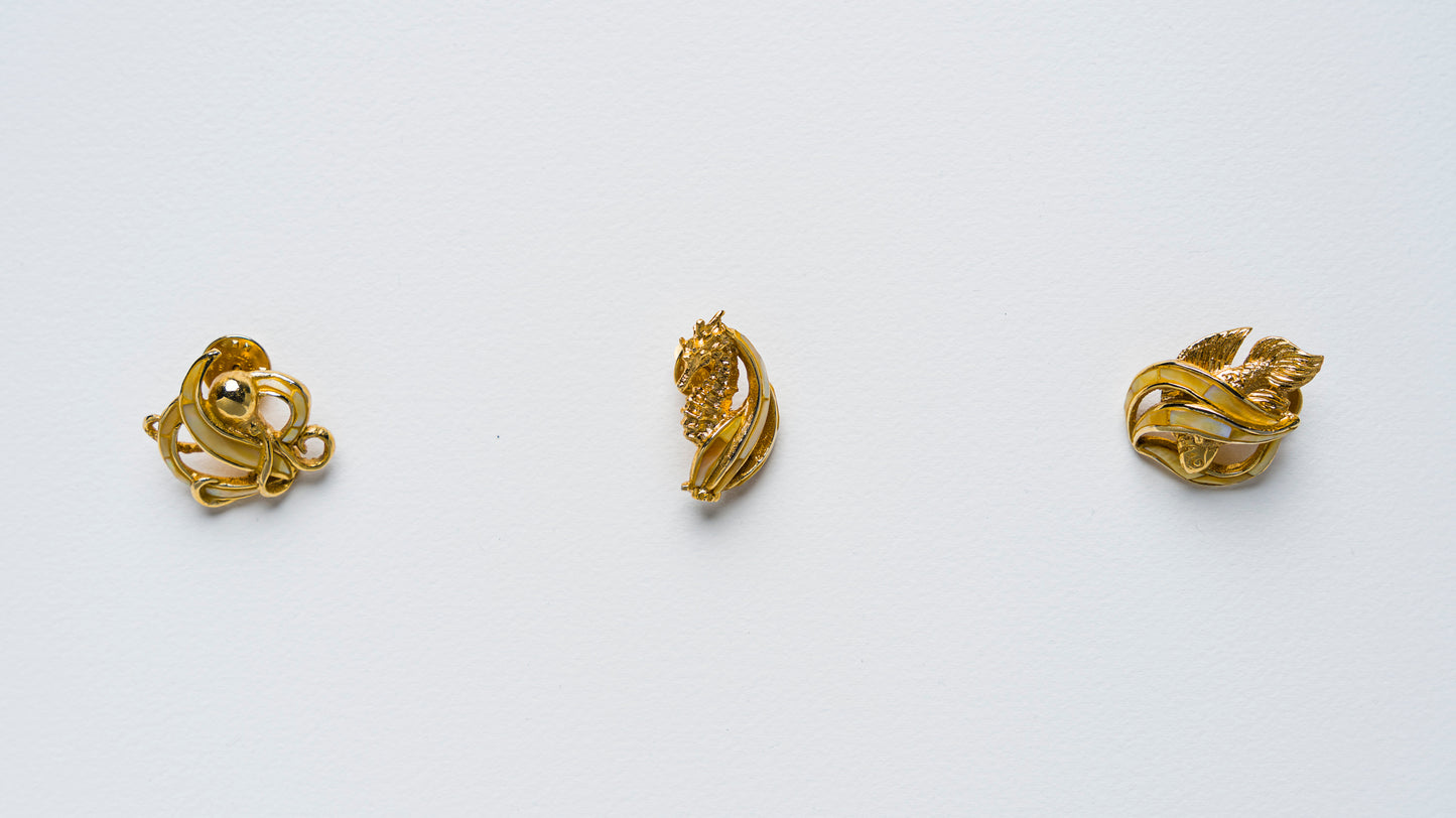 Triton's Brooches in Yellow MOP Shell