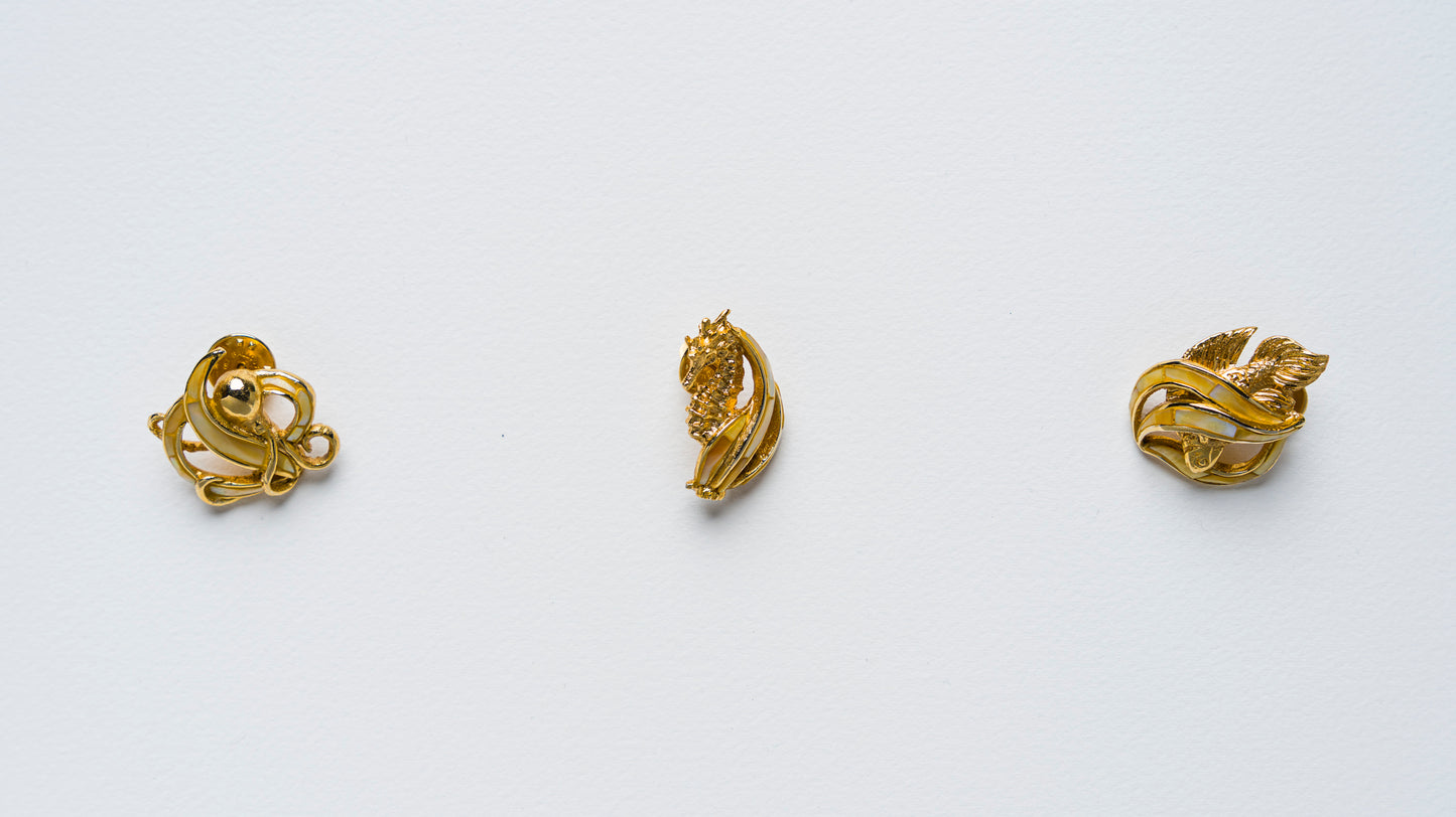 Triton's Brooches in Yellow MOP Shell